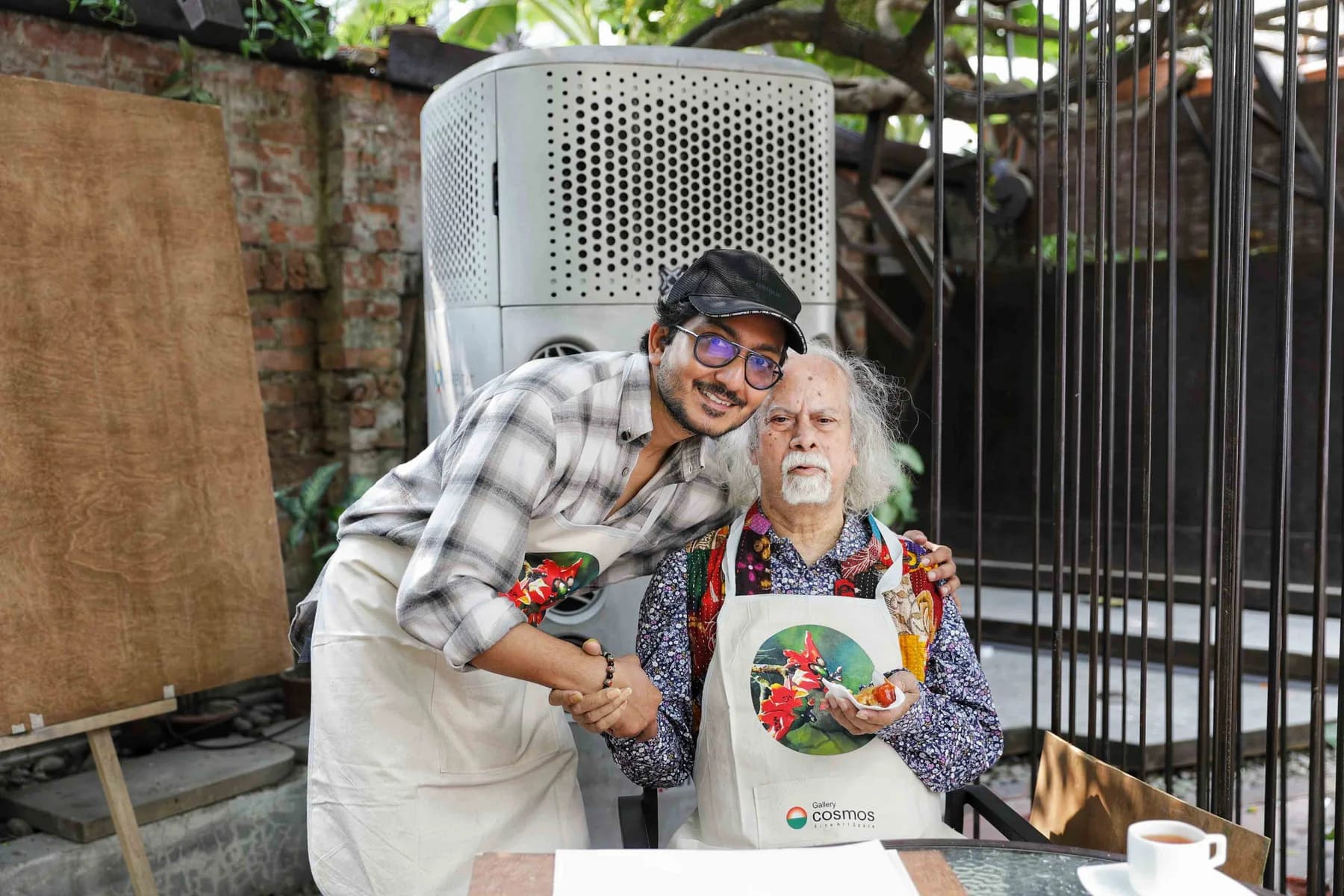 Artists with a finished work — the Live Drawing and Exhibition day at Gallery Cosmos
