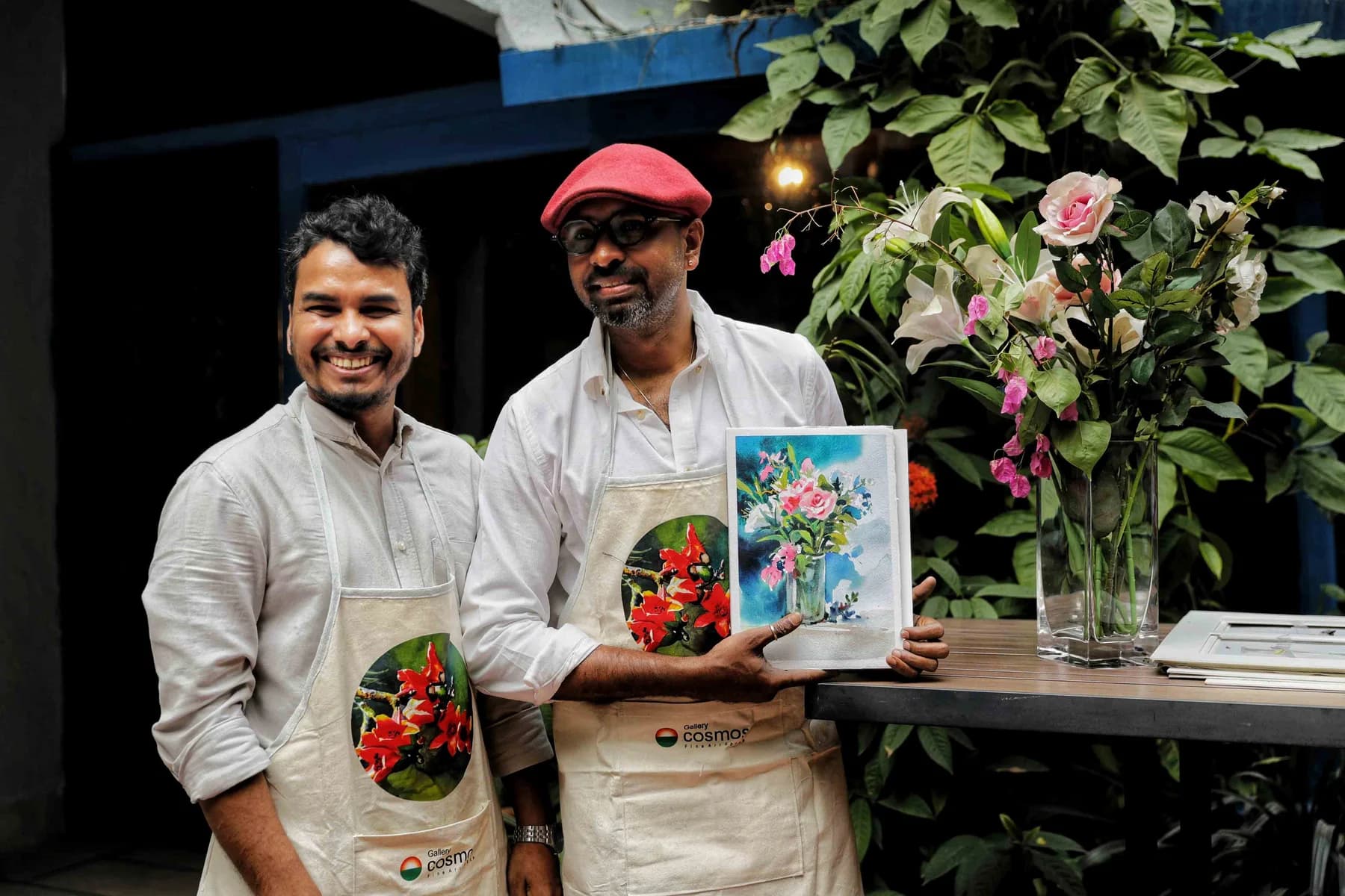 Participants with a floral watercolour — the Live Drawing and Exhibition day at Gallery Cosmos