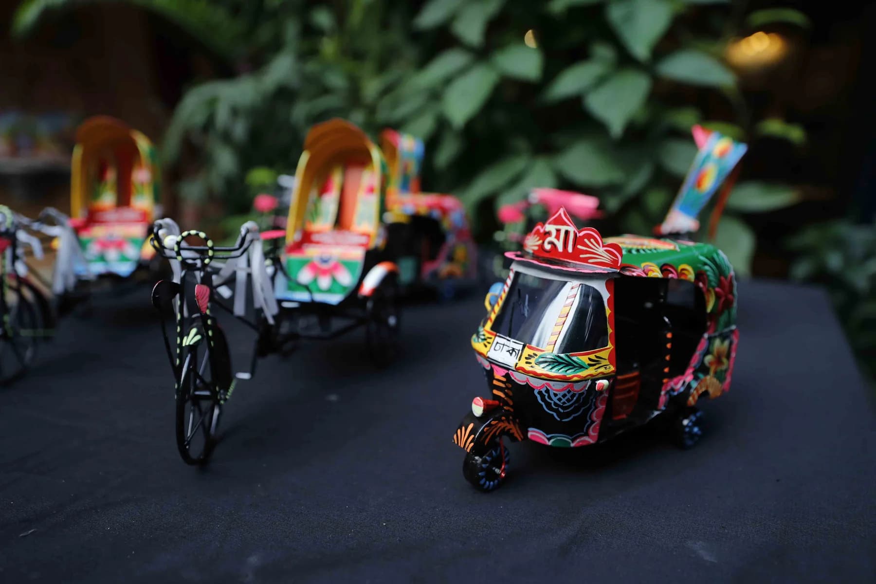 Miniature rickshaw and auto-rickshaw — Rickshaw Art Exhibition at Gallery Cosmos